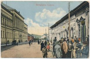 1915 Beregszász, Beregovo, Berehove; Árpád utca, Schutz Károly, Auer Károly Clayton és Shuttleworth üzlete. Farkas és Földes kiadása / street view, shops (EK)