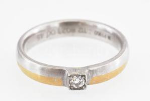 Platina (Pt) gyűrű 18K arannyal díszített, brill kővel (0,15Ct) jelzett. 10 g , m: 64