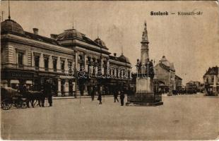 1918 Szolnok, Kossuth tér, Sebők Nándor, Konsitzky György, Fehér Adolf és Komáromi József üzlete, drogéria, népbank. Vasúti levelezőlapárusítás 7366. (ázott / wet damage)