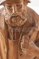 MA jelzéssel: Pipázó mester. Faragott fa, kis kopással, m: 48 cm