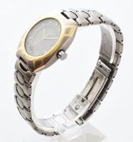 Omega Seamaster női karóra kvarc szerkezettel gyári arany és brill berakással . Dátum kijelzéssel, t...