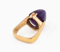 14K arany (Au) gyűrű, elegáns, egyedi formatervezés, ametiszt kővel. Jelzett, bruttó: 11,8 g, méret:...