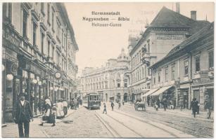 Nagyszeben, Hermannstadt, Sibiu; Heltauergasse, Hotel Römischer Kaiser / Nagydisznódi utca, szálloda, Jul. Rosenthal és Landmann üzlete, villamos. Hátoldalon A Bánat és nyomor enyhítésére - Pro Patria 1914. Első világháborús zsidó katonai újévi üdvözlet héber nyelven / street, hotel, shops, tram. Jewish New Year greeting in Hebrew on the backside