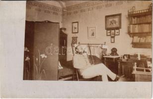 1911 Osztrák-magyar katonatiszt bécsi szállásán pihenget / Austro-Hungarian K.u.k. military officer in his Wiener accommodation. photo