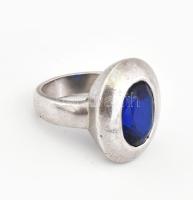 Ezüst(Ag) gyűrű kék kővel, jelzett, méret: 57, bruttó: 11,7 g