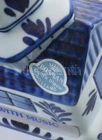 2 db holland porcelán tárgy: boci formájú tejkiöntő, 15x10x5,5 cm + zenélő-forgó szélmalom, működik,...