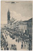 1922 Beszterce, Bistritz, Bistrita; Kórház utca, felvonulás, üzletek. Hausmann Bella kiadása / street view, procession, shops (EB)