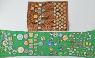 Vegyes ~175db-os szocialista jelvény és kitűző, nagyobbrészt orosz, közte sok mesefigurás darad, két darab textilre tűzve T:vegyes Mixed ~175pcs of socialist badges and pin, mainly russians with lots of cartoon characters on two sheets of textile C:mixed