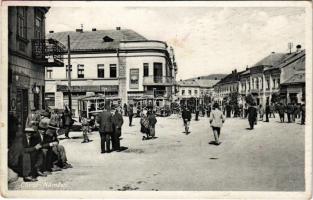 1939 Huszt, Chust, Khust; Fő tér, autóbuszok, Hitelbank, üzletek / námestí / main square, autobuses, credit bank, shops (EK)