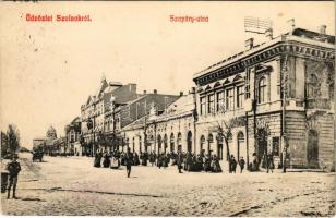 1909 Szolnok, Szapáry utca, zsinagóga a háttérben, üzletek (fl)