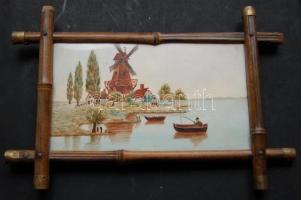 XX. század eleji kézzel festett holland malmot megörökítő porcelánkép, ismeretlen jelzéssel, bambusznád keretben (37 x 24cm)