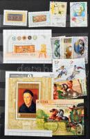 Blokkok, sorok, bélyegzett bélyegek és kb 1400Ft névértékű postázható magyar bélyeg 10 lapos közepes berakóban