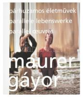 Maurer Gáyor. Párhuzamos életművek. Parallele Lebenswerke. Parallel Oeuvres. Szerk.: Maurer Dóra. Győr,[2003.],Városi Művészeti Múzeum. Magyar és angol nyelven. Gazdag képanyaggal, Maurer Dóra (1937-) festő- és grafikusművész, és Gáyor Tibor (1929-2023) festő- és grafikusművész, építész munkáival gazdagon illusztrált. Kiadói papírkötés.    Gazdag képanyaggal illusztrált. Kiadói kartonált papírkötés.