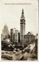 New York City Metropolitan and New York Life Buildings with trams and park