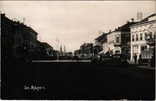 Szászrégen, Sächsisch-Regen, Reghin; Fő utca, Heinrich Binder és Eduard Theil üzlete, Royal cukrászda, autók / main street, shops, confectionery, automobiles. photo