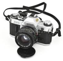 Canon AE-1 fényképezőgép 3 db objektívvel: 1:1,8; 1:4; 1:2,8. Hozzá tartozékok, eredeti film, hordtá...