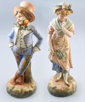 cca 1900, Rudolstadt fiatal dandy és fiatal hölgy figura. Festett biszkvit porcelán, jelzett: alján RW felirat és formaszám. Nyakuk restaurált, m: 36-37 cm