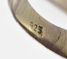 Ezüst(Ag) gyűrű szintetikus rubinnal, jelzett, méret: 58, bruttó: 11,6 g