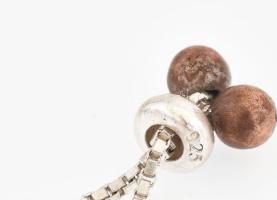 Ezüst(Ag) karkötő aranyszínű középrésszel, jelzett, állítható hosszúság, max: 20 cm, bruttó: 14,7 g