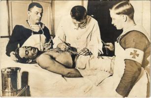 Osztrák-magyar haditengerészet matrózok megrendezett műtét közben / K.u.k. Kriegsmarine Matrosen / Austro-Hungarian Navy mariners during a fake surgery. photo