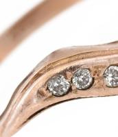 Arany (Au) 14K gyűrű apró kövekkel, 2 db, jelzett, egyik deformációval, bruttó: 3,7 g