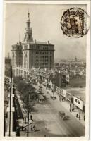 Shanghai, Hua Qiao (Pacific) Hotel, street view with tram and automobiles. photo