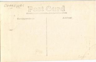 Shanghai, Hua Qiao (Pacific) Hotel, street view with tram and automobiles. photo