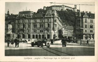 Ljubljana Marijinega square and the castle with Slavenska bank and automobile