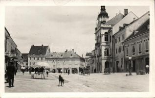 Novo Mesto Petr square with radio shop, pharmacy, gas station and the shops of Urban Norva and Josip Kos