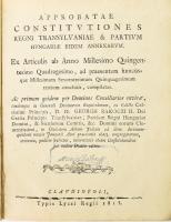 Erdély országának Három Könyvekre osztatott törvényes könyve. Melly approbata, compilata constitutiokbol és novellaris articulusokbol áll. Mostan újabban, minden haza-fiaknak hasznokra ki-botsáttatott.   Első könyv. Approbata constitutiok. Approbatae constitutiones regni Transylvaniae & Patrium Hungaruae eidem annexarum. Claudiopoli, 1815. Typ. Lycei Regii.;   Második könyv. Compilata Constitutiok. Compilatae Constitutiones Regni Transilvaniae & Partium Hungariae eidem annexarum. Claudiopoli, 1815. Typ. Lycei Regii.  Approbata, Compilata Constitutióknak mutató táblája melyet a nemes hazának használására készített és ajánlott étfalvi Halmágyi István, az Erdélyi Nagy Fejedelemség ... titoknokja Kolosvárt 1815   4+3 sztl.+280+2 p.;3 sztl. lev.+118 p.;1 sztl. lev.+90 p.. Magyar és latin nyelven.   Korabeli félbőr-kötésben, kopott gerinccel