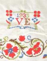 1935 Monogramos díszterítő. Keresztszemes hímzéssel, foltokkal, cca 95x57 cm