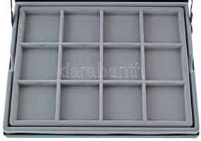 Érmetartó kazetta egy kivehető tálcával, összesen 24db, 50x50mm-es férőhellyel. Használt, de rendkív...