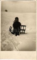 Téli sport, 19 hónapos kisgyerek szánkóval / winter sport, child with sled. photo