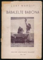 Luby Margit: Bábalelte babona. Bp.,[1943],Magyar Könyvkiadó,(Arany János-ny.), 86+2 p.+IV t. (Második kiadás.) Kiadói papírkötés, sérült, hiányos kiadói papír védőborítóban.