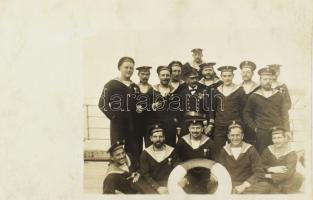 cca 1916 S.M. Dampfer IV (ex Gastein) osztrák-magyar hadihajó kapitánya és legénysége. Fotólap / The captain and the crew of Gastein on deck privately produced photo postcard. S.S. Gastein was an Austrian Lloyd passenger and cargo ship built at Arsenal Lloyd and launched in 1909. Before the war she was on the company's Levant run.   Displacement: 3,817 tons.  Length: 104.9 meters; beam: 13.5 meters. Speed: 12.5 knots   S. S. Gastein was requisitioned in July 1914 and renamed S.M. Dampfer IV. She was converted to an unarmed destroyer depot ship for the Second Torpedo Flotilla and stationed in Pola. She was returned to the Austrian Lloyd in 1917, but requisitioned again in April 1918. The following month, S.M. Dampfer IV was lightly armored, outfitted with radio, and armed with two 4.7 cm, cal. 44, guns and one machine gun, and used as a troop transport until the end of the war.