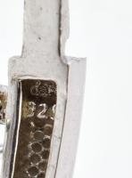 Ezüst (Ag) kövekkel kirakott karperec, jelzés nélkül, 5×6 cm, bruttó: 12,7 g