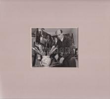 Dániel Kornél Miklós (1923-2002) festő, grafikus munka közben, műtermében készült álló portréja, hát...