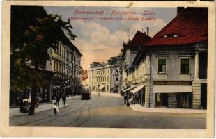 1916 Nagyszeben, Hermannstadt, Sibiu; Disznódi utca, villamos, Julius Wermescher üzlete, Transsylvania szálloda. Jos. Drotleff / Strada Cisnadei / Heltauergasse / street, shops, tram, hotel (EK)