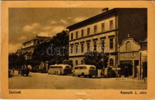 1958 Szolnok, Kossuth Lajos utca, gyógyszertár, autóbuszok. Képzőművészeti Alap kiadóvállalata (lyukak / pinholes)