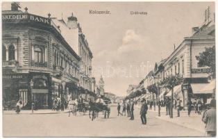 Kolozsvár, Cluj; Unió utca, Kereskedelmi bank, Schultz Rezső, Rácz Béla üzlete. Gombos Ferenc kiadása / street view, bank, shops (fl)