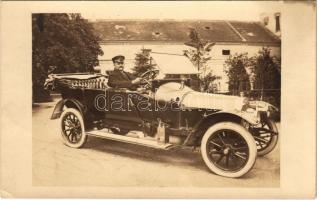 1914 Vintage automobile with chauffeur. photo (EK)