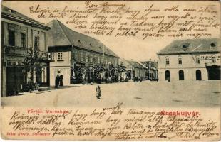 1903 Érsekújvár, Nové Zámky; Fő tér, Városháza, Arany Oroszlán szálloda, Spitzer testvérek és Komáromi üzlete. Ethey Károly kiadása / main square, town hall, shops, hotel (fa)