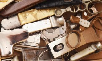 54 db különleges, mind különböző szivarvágó, gyöngyház, fa, réz, fém borításokkal, sokféle formában,...