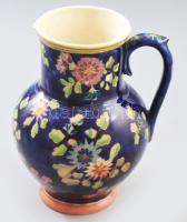 Zsolnay kancsó. cca 1880/90, magastüzű színes mázakkal festett porcelánfajansz. Jelzett: kékkel festett családi pecsét. Kiöntő részénél restaurált, m: 20 cm