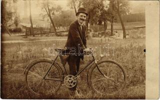 Férfi biciklivel / Man with bicycle. photo (fl)