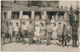 1930 Tátra, Magas-Tátra, Vysoké Tatry; Csorbató villamos vasútállomás / Strbské Pleso railway station, tourists in front of a tram. photo