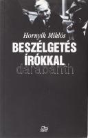 Hornyik Miklós: Beszélgetés írókkal. Vekerdi László utószavával. A szerző, Hornyik Miklós (1944 - 2012) író, újságíró, kritikus, szerkesztő által Mohás Lívia (1928-2024) pszichológus, József Attila-díjas írónak DEDIKÁLT példány. Bp., 2000, Ister. Beszélgetés Füst Milán, Déry Tibor, Weöres Sándor, Örkény István, Pilinszky János, Németh László, Illyés Gyula, Mészöly Miklós, Ottlik Géza. Kiadói papírkötés.