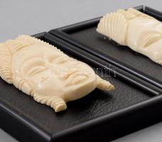 2 darab afrikai faragott csont maszk, m: 10 cm, keretre applikálva