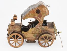 Régi rézlemez autó, hátuljában már em működő zeneszerkezettel, 26x21 cm