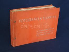 Fotografla Türkiye. La Turquie en image. Turkey in Pictures. Die Türkei im Bild. [Törökország fotóalbuma, fényképezte Othmar Pferschy.] (Ankara), [1936 körül]. (Matbaut Umum Müdürlügü -Druck bei Kunstanstalten F. Bruckmann, München). [20] p. + 154 t. (törökországi enteriőrök, látképek és életképek). Harántfolio. Egyetlen kiadás. A modern Törökország építészetét, kulturális és gazdasági erejét, valamint természeti kincseit bemutató album a török Központi Sajtóiroda megbízásából készült. Az atatürki reformmal kialakult világi Törökország hagyományait, fejlődését, modernségét és életrevalóságát bemutató album fotóanyagának elkészítésére a törökországi témákra szakosodott osztrák fényképészt, Othmar Pferschy (1898-1984) fotóművészt kérték fel. A hat nagy tematikus egységből álló album külön fejezeteket nyit 1. az ország megdöbbentően modernista fővárosának, a Bauhaus-épületek sorával jellemezhető Ankarának - 2. a hagyományos fővárosnak, Isztambulnak - 3. a török vidéknek és természeti kincseinek - 4. az ország régészeti, építészeti és művészeti örökségének - 5. A szerkesztők a legjelentősebb fejezetet a török ipar, közlekedés és mezőgazdaság témájának szentelték - 6. Az album a modern, világi török civilizáció folytatódásának letéteményeseiről, a mindkét nembeli sportoló és tanuló ifjúságról készített fotódokumentációval zárul. A fotóanyag fejezetei között színes határolólapok. A fotódokumentáció előtt a modern török civilizáció török, francia, angol és német nyelvű ismertetése. Az egykori tulajdonos a kötetben elhelyezett egy színes akvarellrajzot, illetve négy archív fotót az épülőfélben levő, egyelőre igen gyéren lakottnak tűnő Ankaráról. Feliratozott kiadói egészvászon kötésben. Jó példány.